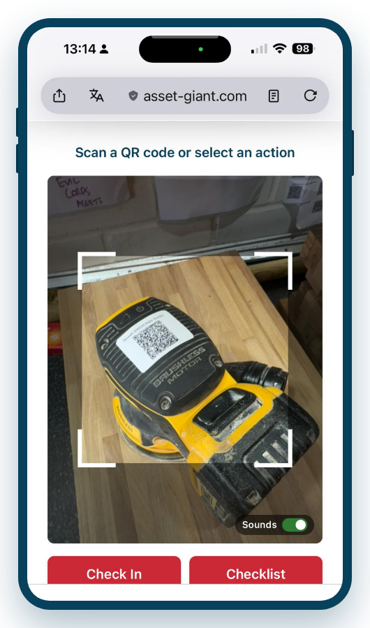 Screenshot — the in-app QR scanner open on a phone, showing its action buttons.