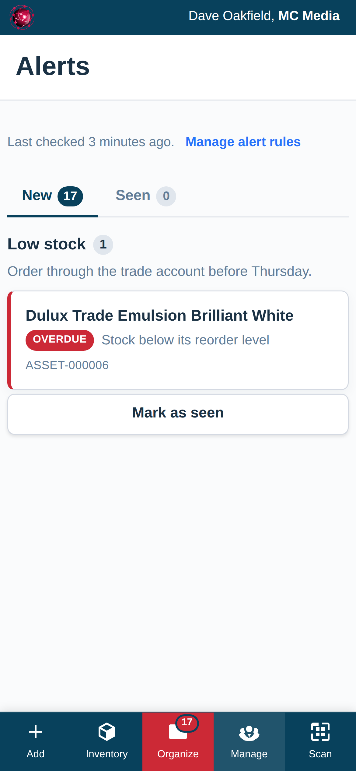 The Alerts page on a phone with the Low stock rule's message and one row for a paint consumable, marked Overdue with Stock below its reorder level.