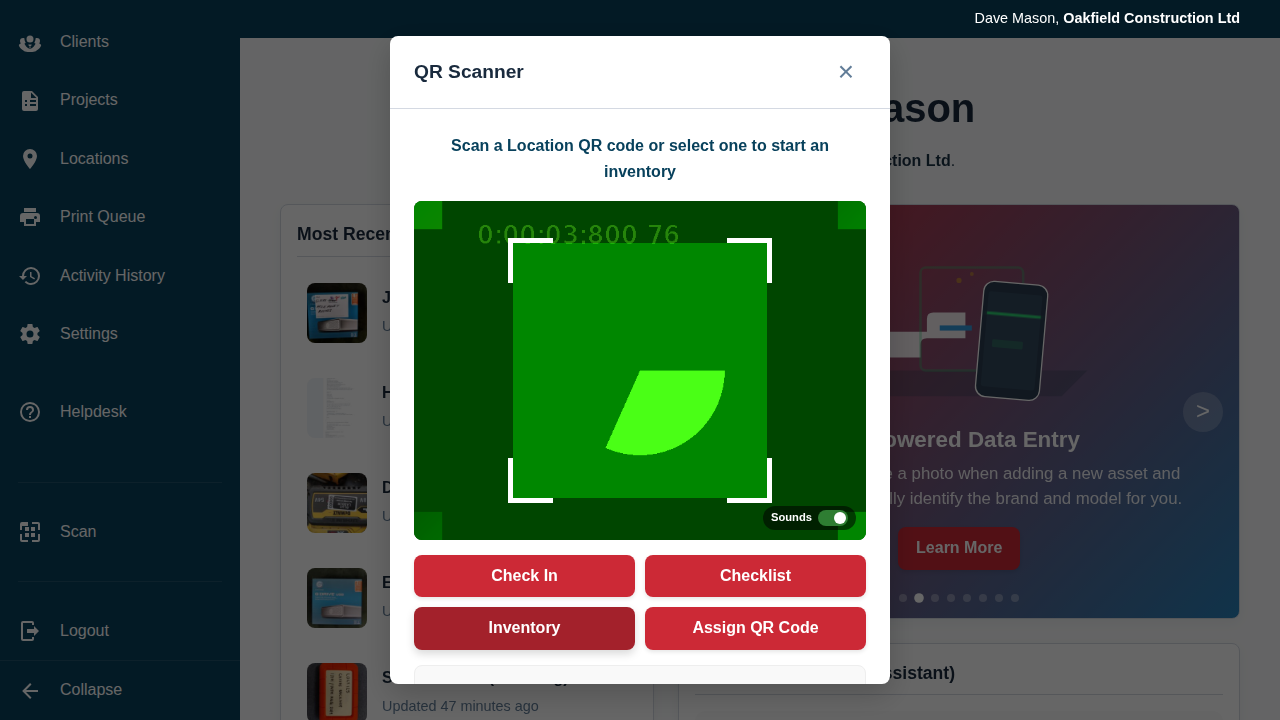 The scanner interface showing the location selection dropdown and the prompt to scan a location QR code.